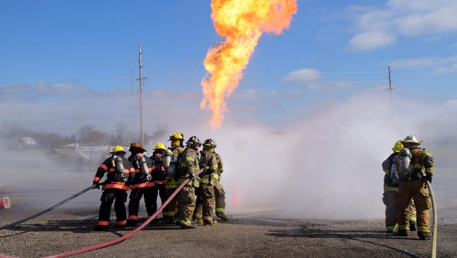Firefighters train on Handling Anhydrous Ammonia and Propane Emergencies as area fire departments once again took part in a Rural Fire-Rescue Weekend in Grinnell.