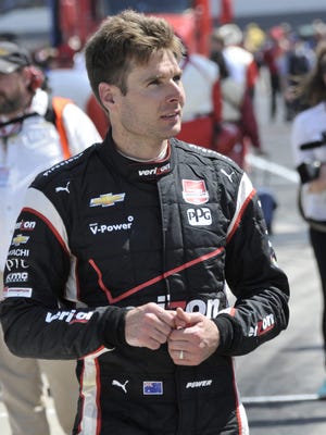 Will Power walks through the pit lane after after finishing second in the 99th Indianpolis 500 on May 24, 2015.