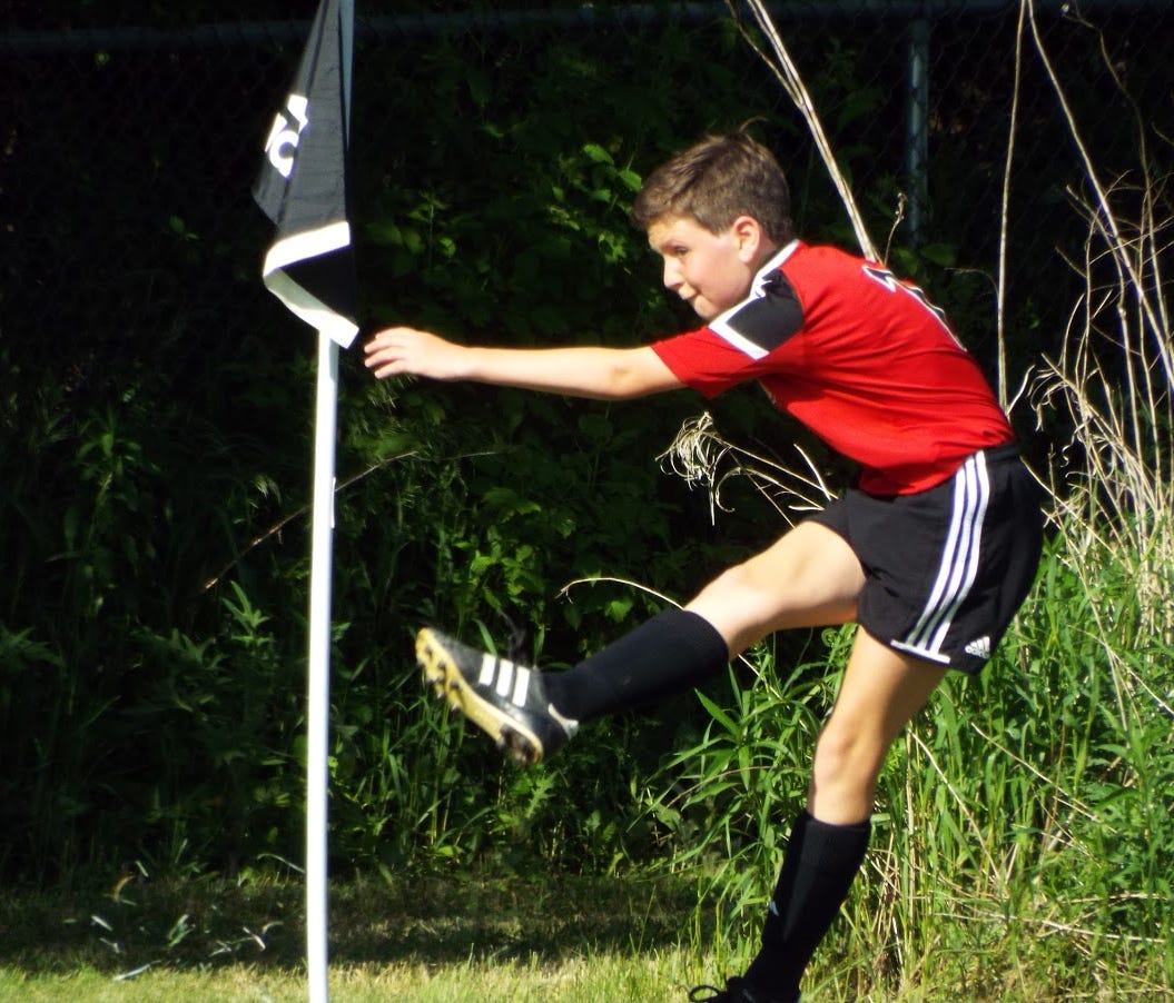 Stella Blau has a corner kick for the Madison 56ers.