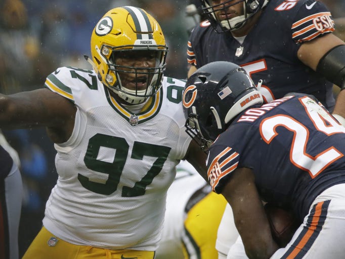 Green Bay Packers nose tackle Kenny Clark (97) misses