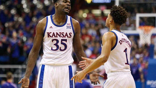 Former Kansas basketball center Udoka Azubuike, left, was drafted No. 27 overall by the Utah Jazz in the NBA Draft on Wednesday night.