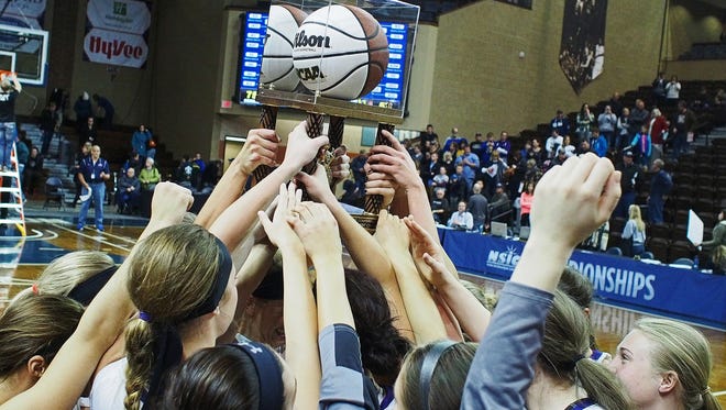 USF players celebrate their 75 to 57 victory over Augustana in the NSIC women's basketball tournament championship game Tuesday, March 1, 2016, at the Sanford Pentagon in Sioux Falls. 