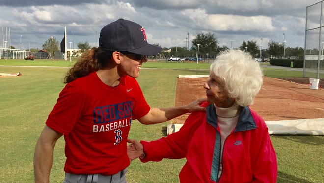 Maybelle Blair, 90, a player from the World War-II era All-American Girls Professional Baseball League, talks with Boston Red Sox Women's Fantasy Camp instructor Ila Borders after the two had a five-minute throwing session on Wednesday, Jan. 10, 2018, at JetBlue Park in Fort Myers.