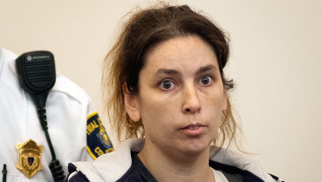 Erika Murray of Blackstone, Mass. is arraigned on 2 counts of murder and other charges in Worcester Superior Court in Worcester, Mass. Monday Dec.29, 2014. Murray pleaded not guilty to two counts of murder after the skeletal remains of three babies were found in her squalid home.