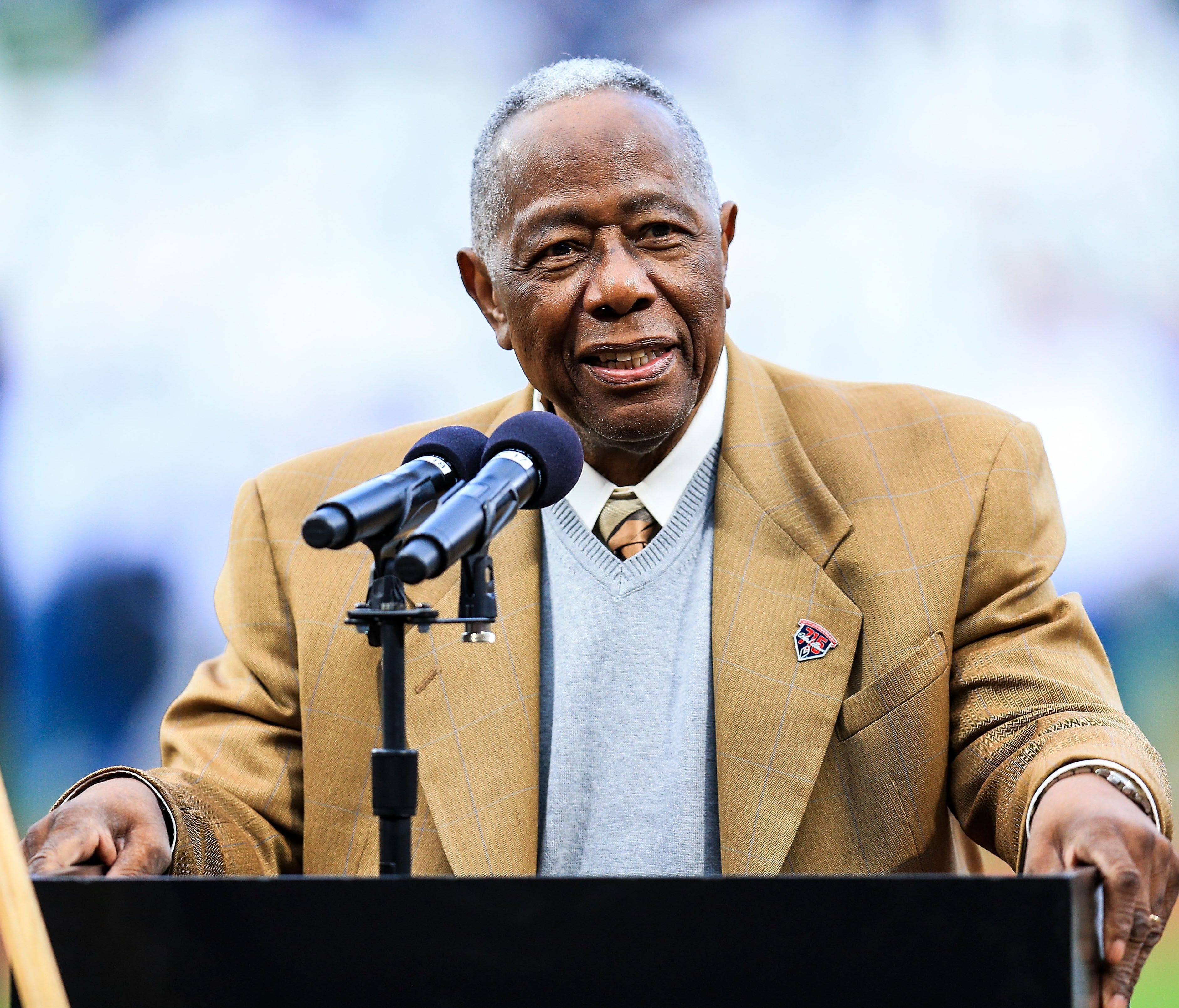 Former Braves slugger Hank Aaron speaks during a 2014 ceremony at Turner Field in Atlanta honoring the 40th anniversary of his record-breaking 715th home run.