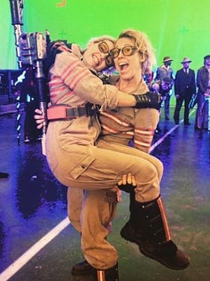 Meredith Richardson of Montgomery gives actress Kate McKinnon a lift. Richardson was McKinnon's stunt double in the new "Ghostbusters" movie. 