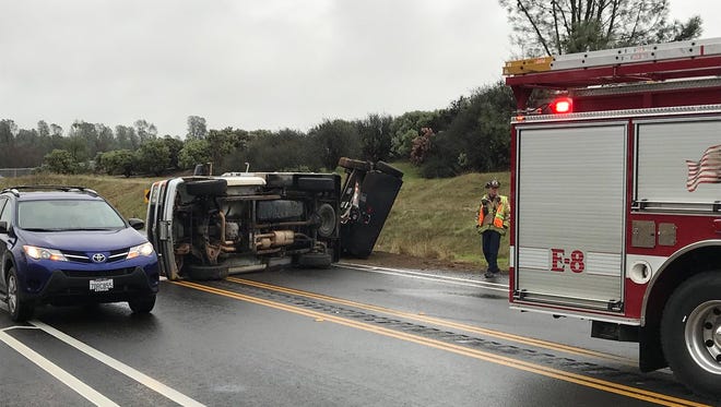 Traffic was slow going on Churn Creek Road north of Bodenhamer Boulevard after a pickup hauling a trailer overturned.