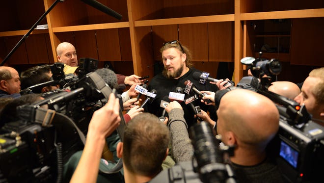 Green Bay Packers guard Josh Sitton talks to reporters about the loss to the Seattle Seahawks in the NFC Championship game, in the locker room, Monday, January 19, 2015 Sunday.