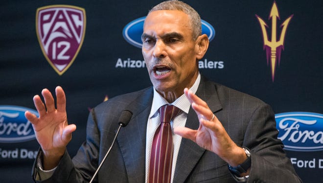 Arizona State University head football coach Herman Edwards takes questions from the media after his introduction at Sun Devil Stadium on Monday December 4, 2017.