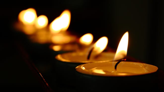 Tea light votive candles in a Catholic Church