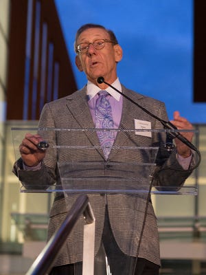Stephen Ross speaks about his colleague, Jeff Blau, during the ribbon cutting ceremony celebrating the newly built Jeff T. Blau Hall in October 2016 at the University of Michigan in Ann Arbor.