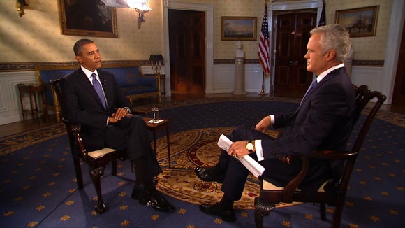 In this handout photo provided by CBS News, President