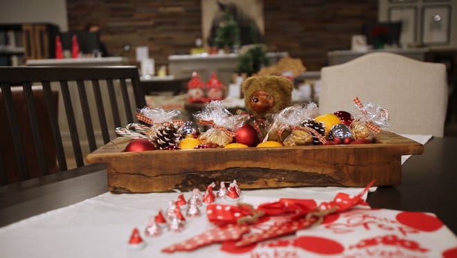 All you need is a Childs toy surrounded by festive goodies to create the perfect holiday snack table
