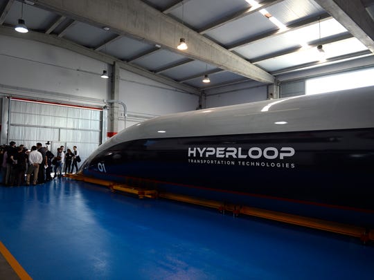 A full-scale passenger Hyperloop capsule is presented by Hyperloop Transportation Technologies on October 2, 2018 in El Puerto de Santa Maria. - A hyperloop is a shuttle that travels on magnetic rails, somewhat like a train, but which runs in a tube with little or no air. In theory, hyperloops could allow travel faster than the speed of sound. Virgin Hyperloop One, backed by British tycoon Richard Branson, has been testing its hyperloop system in Nevada in the United States with speeds reaching 240 miles (386 kilometres) an hour, and is planning three production systems in service by 2021. (Photo by CRISTINA QUICLER / AFP)        (Photo credit should read CRISTINA QUICLER/AFP/Getty Images)