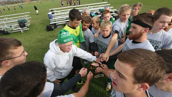 All hands join in with coach Gordon "Scotty" Martin as he gives instructions to his North Rose-Wolcott varsity soccer team before a scrimmage on Tuesday at Wayne Central.