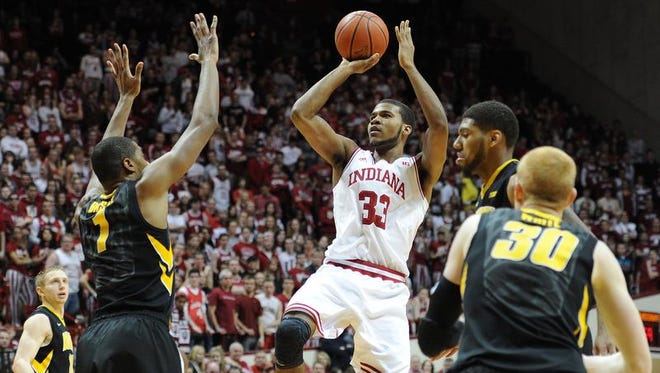 Indiana forward Jeremy Hollowell takes a jump shot against Iowa inside Assembly Hall, Thursday, February 27, 2014, in Bloomington.