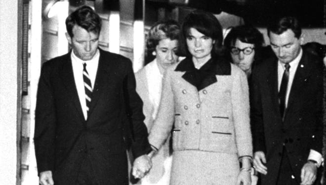 Mystique Cloaks Jackie Kennedy S Pink Suit