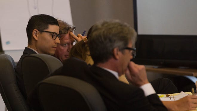 Tai Chan along with his defense team appear in court for the sixth day of Chan's retrial, Tuesday, May 16, 2017 at the Third Judicial District Court in Las Cruces.