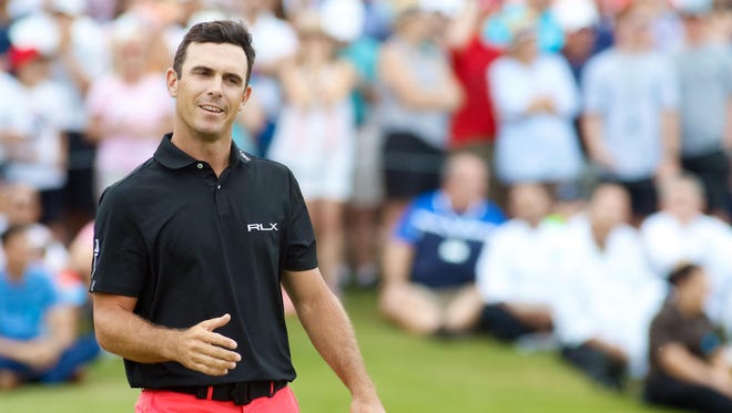 Billy Horschel goes to shake the hand of Jason Day (not pictured) after beating Day in a playoff to win the AT&T Byron Nelson on May 21.