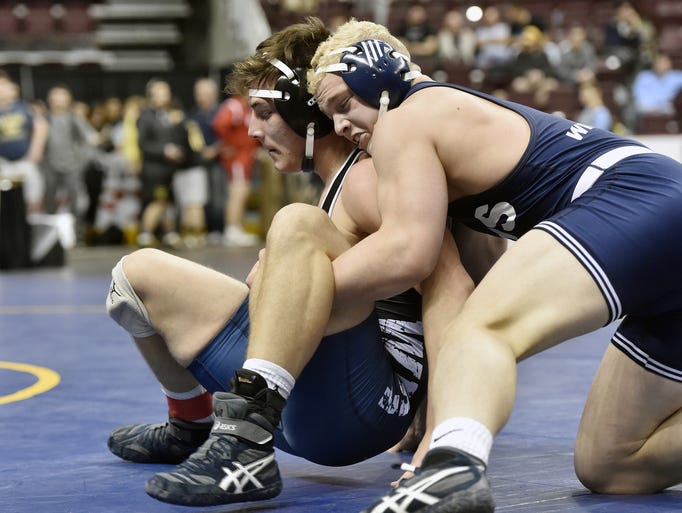 Dallastown's Bryce Shields, right, wrestles Pocono