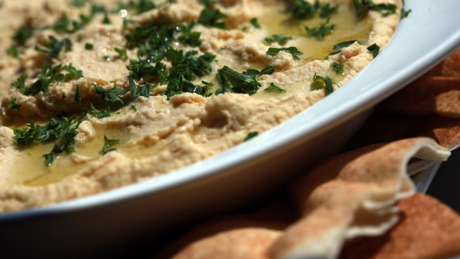 Tahini sauce is one of the key ingredients for making hummus — the thick Middle Eastern dip made with chickpeas and typically served with pita bread or chips.