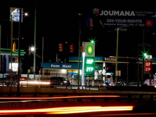A time exposure showing gas stations that are part