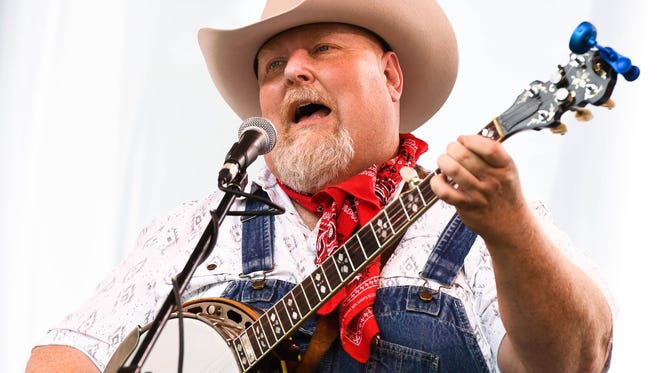MIKE LAWRENCE / THE GLEANERT. Billy with the Nashville Hayriders play at the 31st annual Bluegrass in the Park/Folklife Festival in Henderson’s Audubon Mill Park Friday, August 12, 2016.