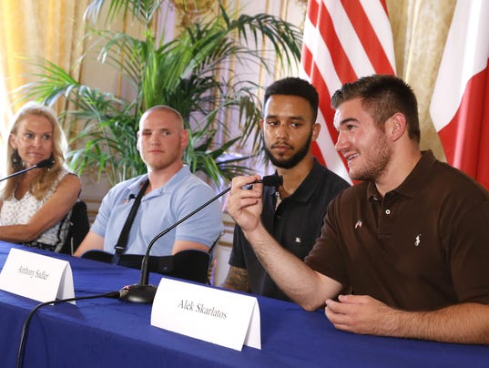 Three of the six men who fought a well-armed terrorist on a train from from Amsterdam to Paris