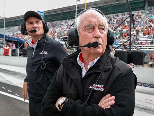 Team owner Roger Penske and Tim Cindric,left, on qualification