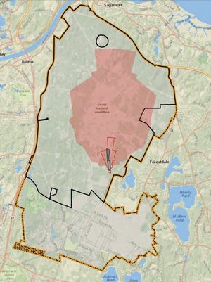 The area outlined in red shows the location of an eight-lane machine gun range and support buildings proposed for training at Camp Edwards. Joint Base Cape Cod is outlined in yellow, with Camp Edwards in black and the designated surface danger zone, where projectiles could land, in pink.