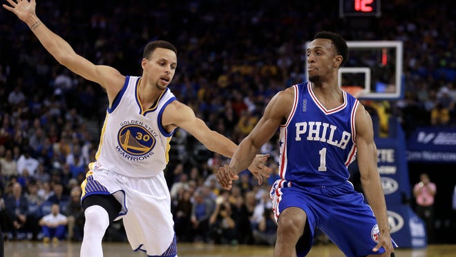 Ish Smith, right, agreed to a three-year, $18 million deal to be the Pistons' backup point guard.