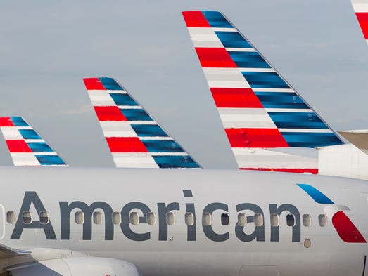 American Airlines jets rest at Dallas/Fort Worth International