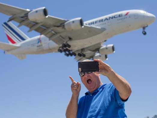 A gentleman has fun taking a selfie with an arriving