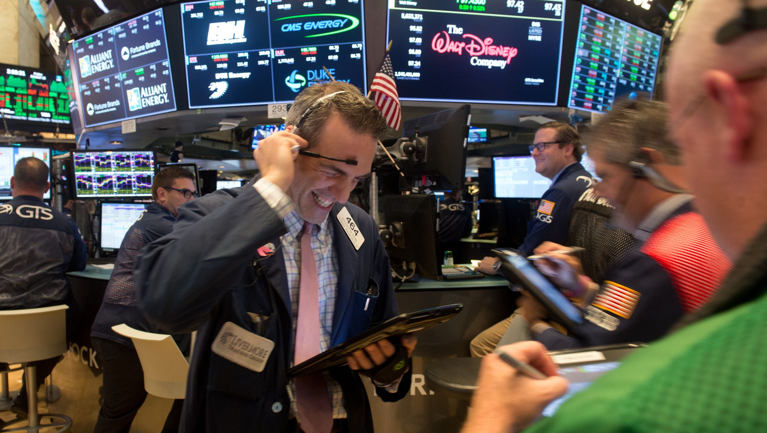 Dow tops 23,000 milestone for first time and notches another record