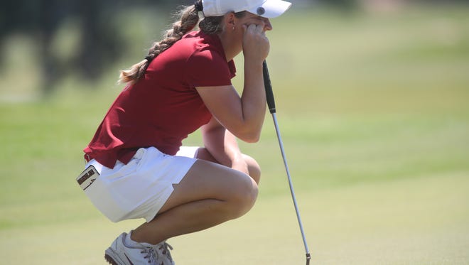 FSU’s Kathleen Sumner sizes up a putt during the NCAA Women's Golf Regional Championships Wednesday, May 9, 2018.