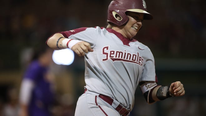 FSU's Jessie Warren hits a 3-run home run in the bottom of the seventh inning to bring the Seminoles within one run, though they eventually fell 6-5 against LSU in their NCAA Super Regional at JoAnne Graf Field on Friday, May 25, 2018. 