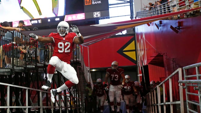 Cardinals defensive lineman Frostee Rucker takes the field before the game vs. the Kansas City Chiefs.