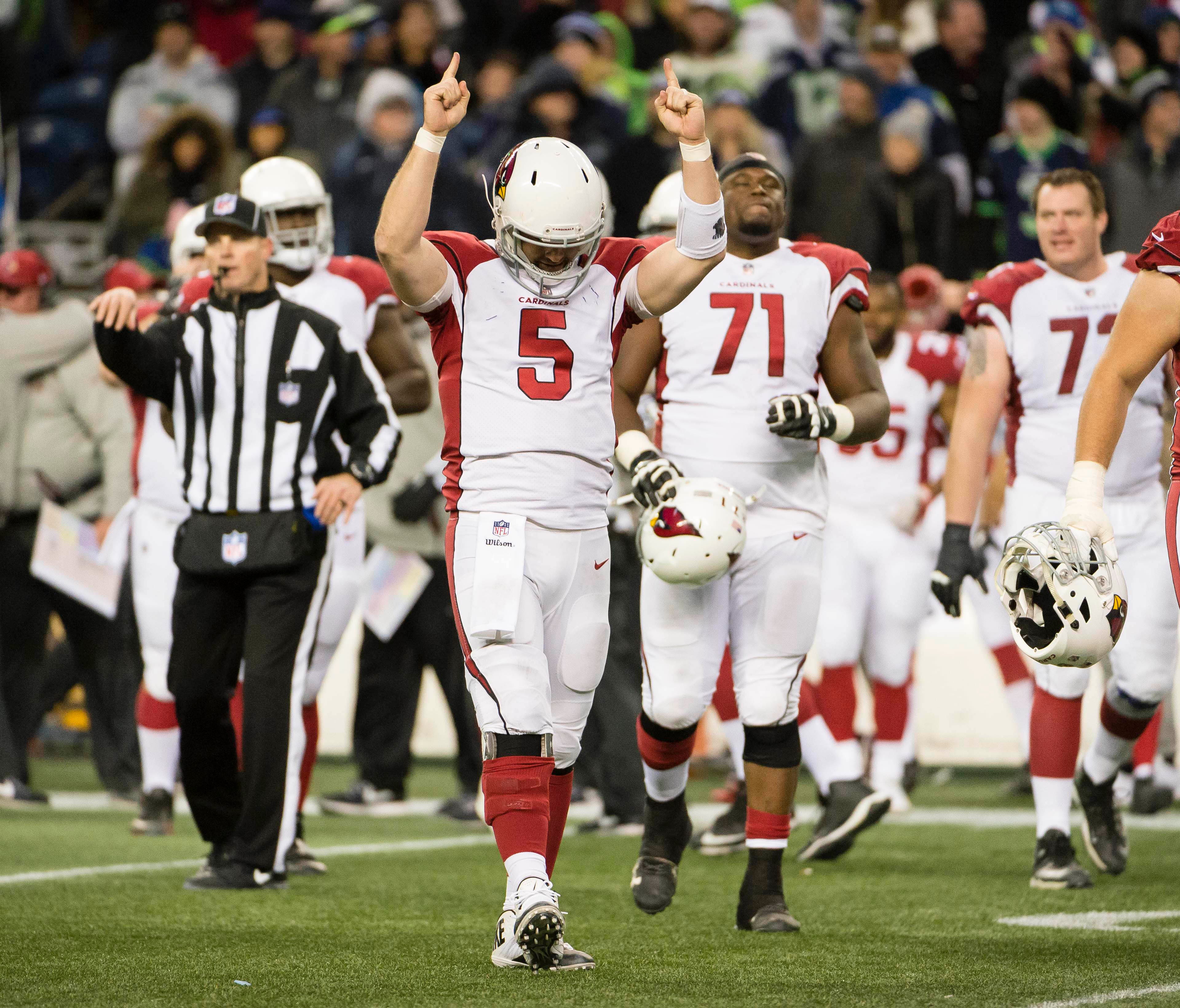 Dec 31, 2017; Seattle, WA, USA; Arizona Cardinals quarterback Drew Stanton (5) celebrates after the Seattle Seahawks missed a field goal during the second half during a game at CenturyLink Field. The Cardinals won 26-24. Mandatory Credit: Troy Wayryn