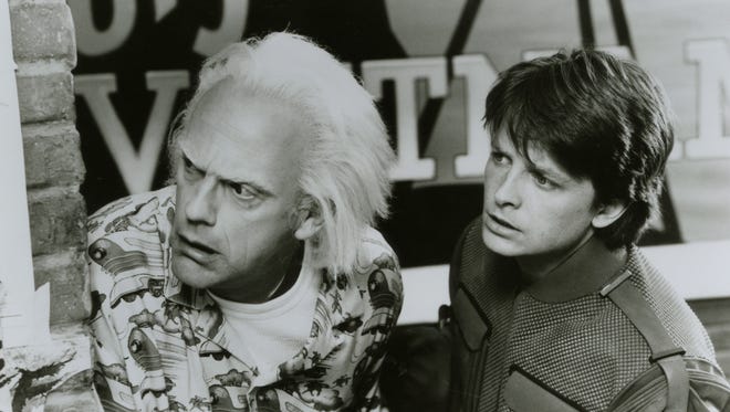 Christopher Lloyd, left, and Michael J. Fox in a scene from 'Back to the Future II.'