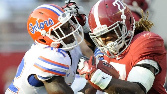 A Yulee, Fla., native, sophomore tailback Derrick Henry rushed for 111 yards and a touchdown in Alabama's 42-21 win over Florida.