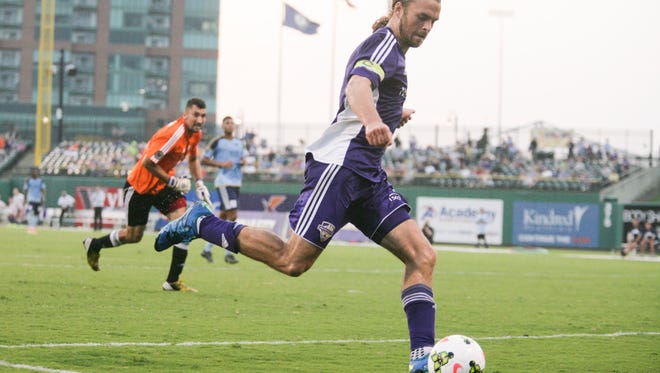 Louisville City FC forward Matt Fondy takes a shot for his second goal in the first half against Harrisburg City Islanders on Wednesday night. Fondy would have three in the first half. Sept. 3, 2015