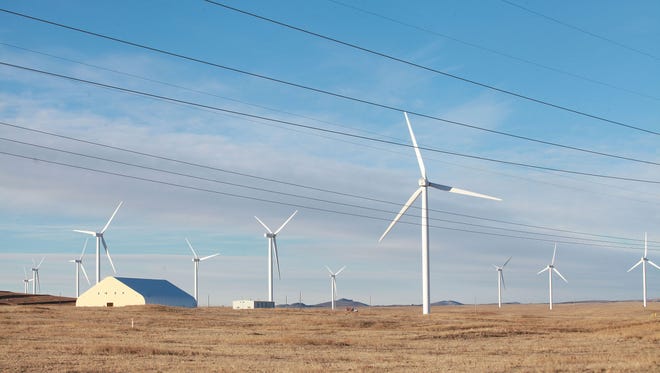 Duke Energy's Happy Jack wind farm near Cheyenne, Wyoming generates electricity on Dec. 6, 2016.
