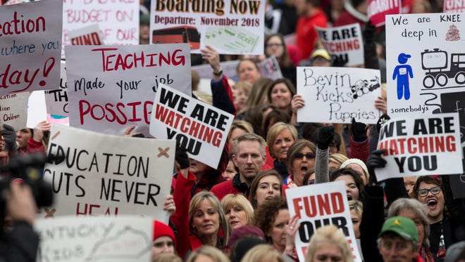 Teachers rallied in front of KEA headquarters before marching on the Kentucky State Capitol to protest recent changes to their pensions. April 2, 2018