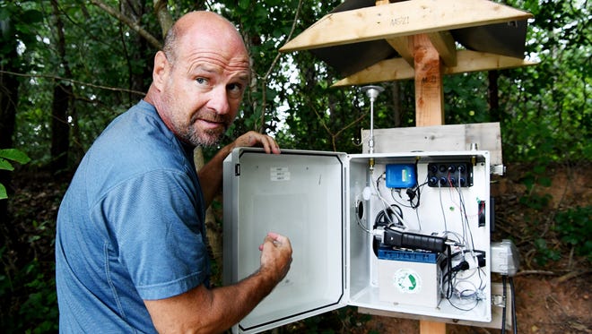 Craig Zeller, EPA remediation project manager, opened an air quality sensor at the CTS hazardous waste landfill in 2018 when workers used massive amounts of electricity to raise the floor temperature to 190 degrees, causing the contaminants it contained to evaporate and evacuate as steam.