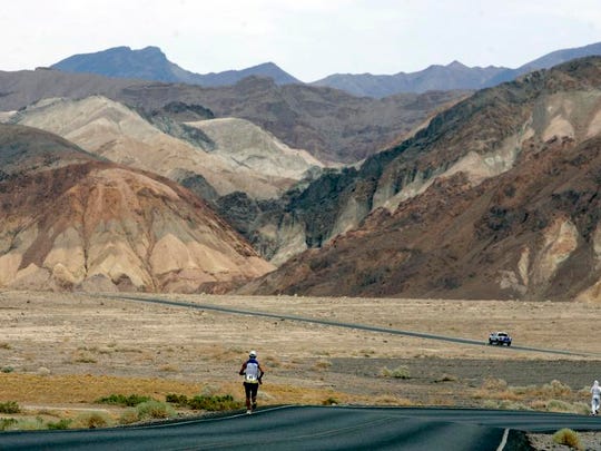  Valmir Nunes, of Brazil, runs in Kiehl's Badwater Ultramarathon in Death Valley, Calif. The race start line was at Badwater, Death Valley, which marks the lowest elevation in the Western Hemisphere at 280 feet below sea level. (AP) 