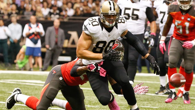 New Orleans Saints tight end Jimmy Graham (80) runs after a catch against the Tampa Bay Buccaneers during the third quarter of a game at Mercedes-Benz Superdome.
