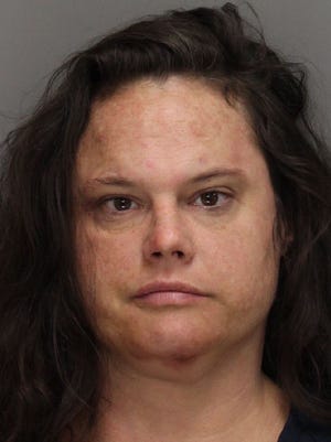 Jennifer Nicholson, of Marietta, Ga., faces charges including public indecency and aggravated battery for an incident at a Waffle House in Kennesaw, Ga., on Jan. 8, 2016.