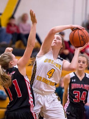 Colonel Crawford's Ashley Gwirtz goes to the basket Tuesday evening.