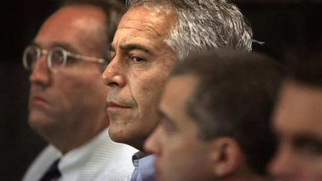 Jeffrey Epstein in court in 2008 to enter a plea to two prostitution-related charges, only one involving a minor.
