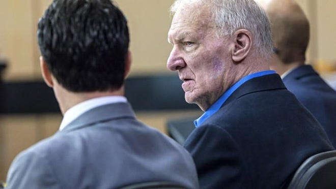 John MacLean with his attorney in Palm Beach County Circuit Court in 2018.
